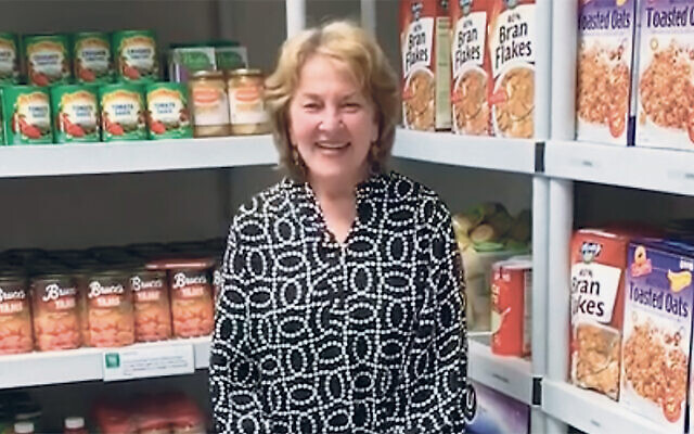 Susan Greenbaum in the JFCS food pantry, the Corner Market. (Courtesy JFCS)