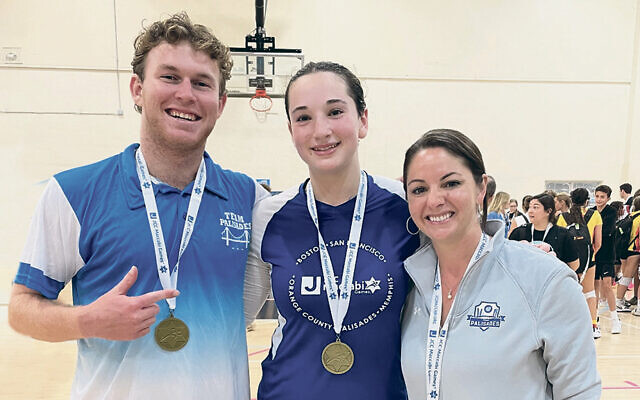 In Fort Lauderdale, Team Palisades co-captain Ava Marchfeld is flanked by volleyball coach Davey Singer and Team Palisades delegation head Raychel Reilly. (JCC Maccabi Games)