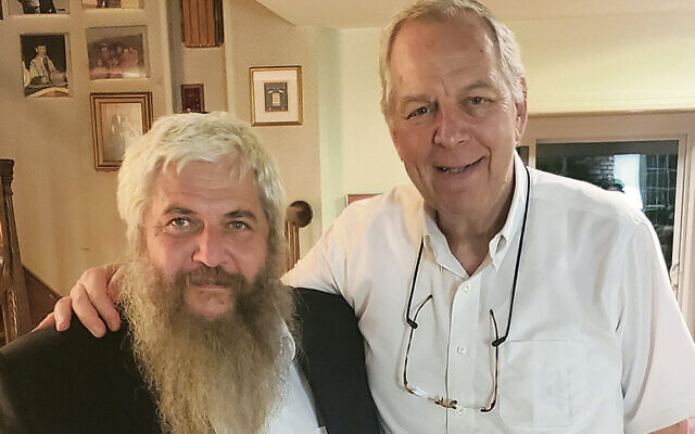 Rabbi Azman and Dr. Kenneth Prager meet again, 37 years later, this time in Dr. Prager’s home in Englewood. (Dr. Kenneth Prager)
