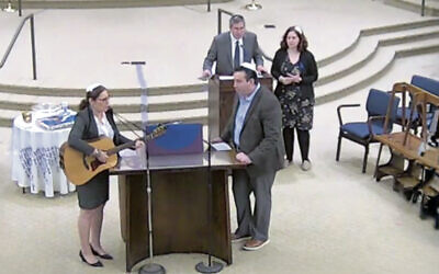 From left, Cantor Maria Dubinsky on guitar, Cantor David Krasner, and Rabbis Rachel Salston and Arthur Weiner.