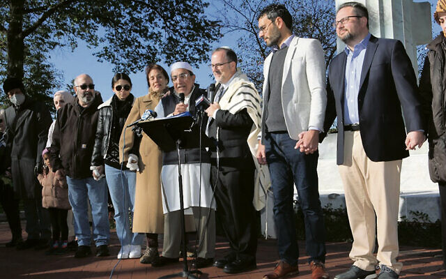Rabbi David Fine and Imam Mahmoud Hamza join to read a statement at a Ridgewood press conference. (Johanna Resnick Rosen)