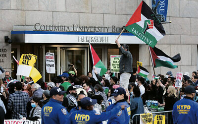 Pro-Palestinian activists protest outside Columbia University  on April 20, 2024. (Leonardo Munoz / AFP)