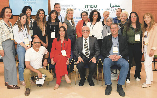 Dr. Sivan Spitzer and Professor Naim Shehadeh, front row center, with SPHERE administrators and staff.