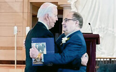 Abe Foxman and President Joe Biden embrace at Holocaust Memorial Day at the Capitol. (Stacey Saiontz)
