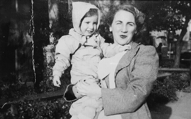 Ida Rosen holds her daughter Tzivia, around 1948-1949.