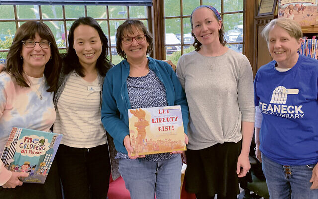 From left, Andria Rosenbaum, Teaneck Library director Shinae Hyun, Chana Stiefel, Ohr Saadya youth director Sara Weinberg, and the library’s head of youth services, Amy Sears (Esther Kook)