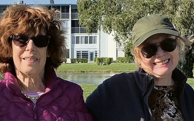 Esther Kook, right, with her sister Eve.