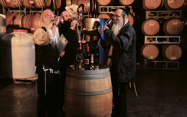 Winemaker Aharon Ziv with Or Haganuz’s winemaking team