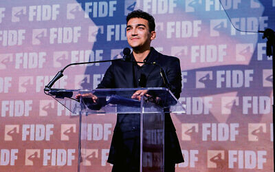 Edan Alexander speaks at a dinner for the Friends of the IDF in  Manhattan (Michael Priest Photography)