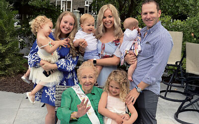 Marilyn Mallock is surrounded by some of her grandchildren and great-grandchildren.