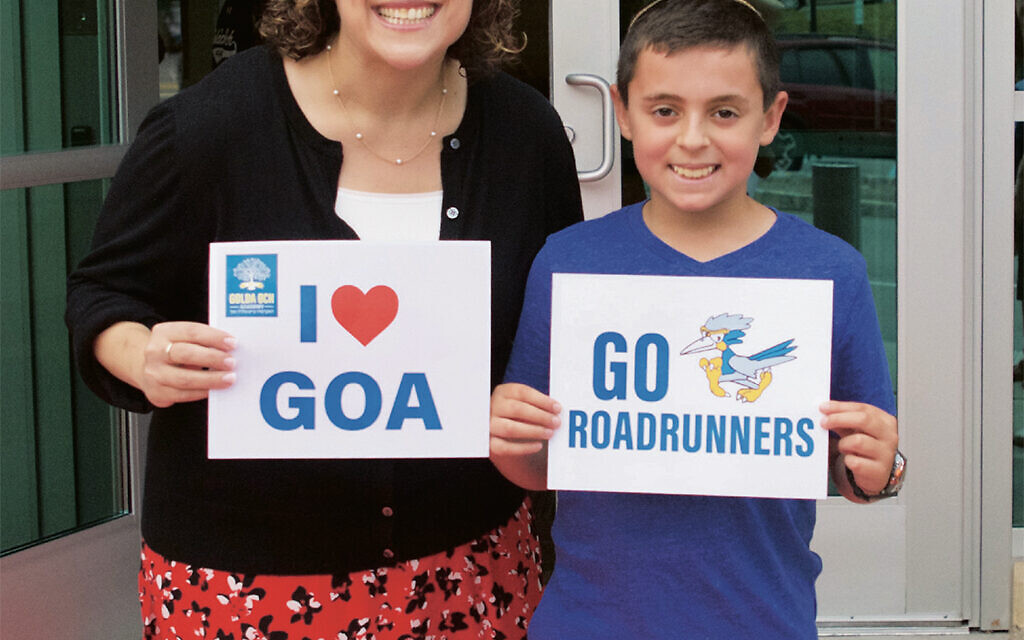 ON THE COVER: A few years ago, Carrie Siegel and her son, Zach, stand outside GOA. (GOA)