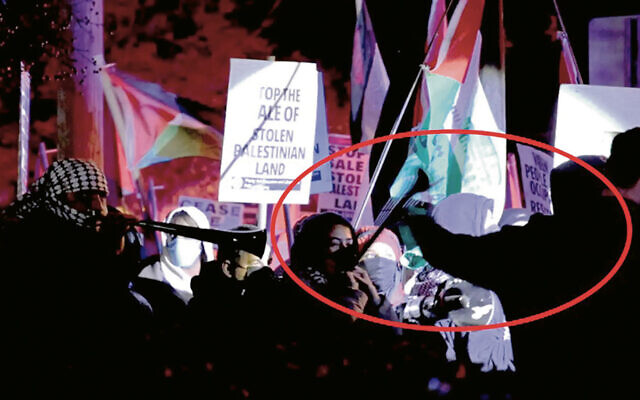 Protesters at the West Orange shul blew loud horns, waved signs, and screamed before the evening turned violent. (Courtesy of the U.S. Department of Justice)