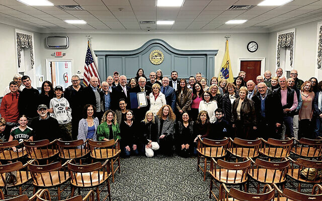 Temple Beth Rishon members gather at Wyckoff’s town hall as Mayor Rudy Boonstra holds up the proclamation congratulating the shul on its anniversary. Temple Beth Rishon members gather at Wyckoff’s town hall as Mayor Rudy Boonstra holds up the proclamation congratulating the shul on its anniversary.