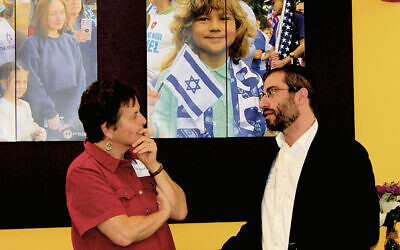 Marcia Kagedan and Rabbi Reuven Lebovitz confer at the roundtable. (All photos courtesy Center for Teen Engagement)