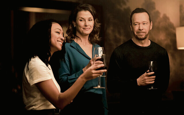 Lena Silver (Sonequa Martin-Green), Erin Reagan (Bridget Moynihan) and Danny Regan (Donnie Wahlberg) make kiddush at Shabbat dinner. (All photos courtesy Boston Blue) Lena Silver (Sonequa Martin-Green), Erin Reagan (Bridget Moynihan) and Danny Regan (Donnie Wahlberg) make kiddush at Shabbat dinner. (All photos courtesy Boston Blue)