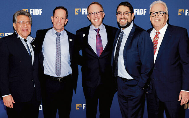 FIDF New Jersey chapter co-founder, national and NJ board member Sammy Bar-Or; FIDF CEO Nadav Padan; FIDF NJ board co-presidents Elias Marcovici and Jason Cuttler, both of Englewood; and Howard Gases, executive director of FIDF New Jersey and the Greater Philadelphia area. FIDF New Jersey chapter co-founder, national and NJ board member Sammy Bar-Or; FIDF CEO Nadav Padan; FIDF NJ board co-presidents Elias Marcovici and Jason Cuttler, both of Englewood; and Howard Gases, executive director of FIDF New Jersey and the Greater Philadelphia area.