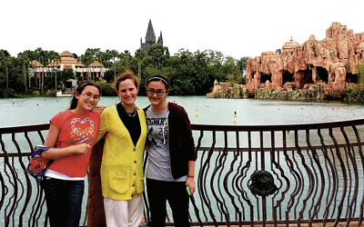 Lori Fein, flanked by her two oldest daughters, wears her see-through gift pantaloons.