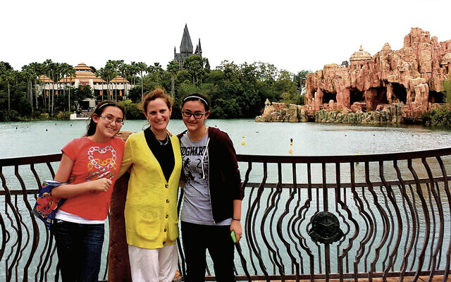 Lori Fein, flanked by her two oldest daughters, wears her see-through gift pantaloons.
