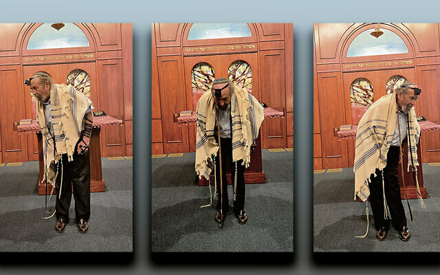 Rabbi Lenny Mandel demonstrates how to bow while davening.