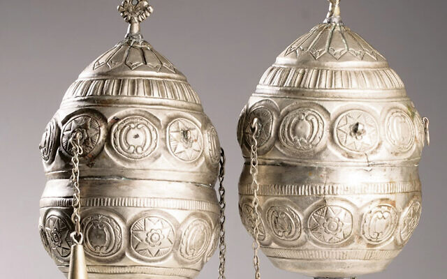 This pair of finials once adorned the wooden rollers of a Torah scroll. (Photos Jewish Historical Institute in Warsaw)