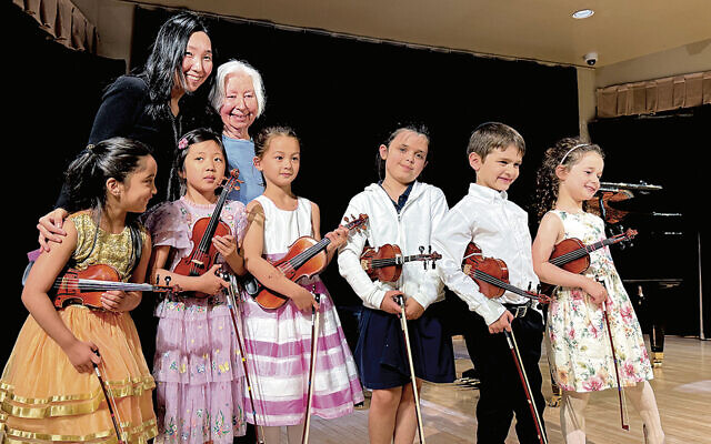 Ms. Roffman and pianist Eunae Kim join Thurnauer students after a performance. Ms. Roffman and pianist Eunae Kim join Thurnauer students after a performance.