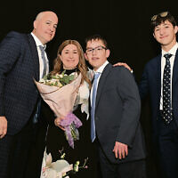 Leo, Dina, Eli, and Mendy Herskovich on stage after the premiere of “Eli.” Leo, Dina, Eli, and Mendy Herskovich on stage after the premiere of “Eli.”