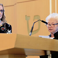 Toby Smulewitz, right, reads the Legacy Acceptance in Yiddish. Gale S. Bindelglass read the English translation.