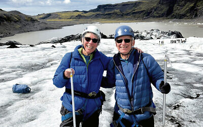 Merrill and Andy Silver are on a glacier in Iceland.