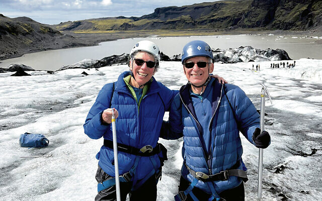 Merrill and Andy Silver are on a glacier in Iceland.