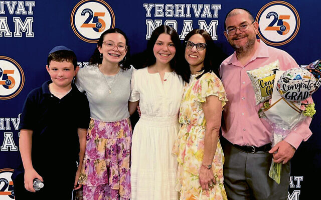 Hillel, Hannah, Naama, Rena, and Joshua Steinberg are at Naama’s recent eighth-grade graduation.