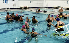 Swimmers and volunteers work together in the pool at the Kaplen JCC on the Palisades in Tenafly. (All photos courtesy MS Swim-In)