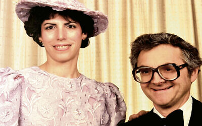 Eve Kofman, standing, and Maurice Kofman, sitting, at Esther Kook’s wedding.