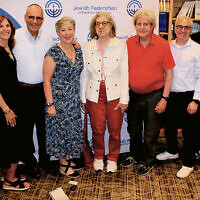 From left: the federation’s CEO, Jason Shames, with its past presidents — Jayne Petak, Zvi Marans, Roberta Abrams, Eva Lynn Gans, Ron Rosenzweig, Dan Shlufman, and Daniel Herz. Andrew Kent, right, is the new president. From left: the federation’s CEO, Jason Shames, with its past presidents — Jayne Petak, Zvi Marans, Roberta Abrams, Eva Lynn Gans, Ron Rosenzweig, Dan Shlufman, and Daniel Herz. Andrew Kent, right, is the new president.