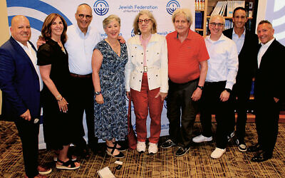 From left: the federation’s CEO, Jason Shames, with its past presidents — Jayne Petak, Zvi Marans, Roberta Abrams, Eva Lynn Gans, Ron Rosenzweig, Dan Shlufman, and Daniel Herz. Andrew Kent, right, is the new president. (Photos courtesy Jewish Federation of Northern New Jersey)