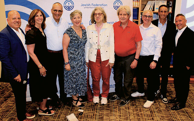 From left: the federation’s CEO, Jason Shames, with its past presidents — Jayne Petak, Zvi Marans, Roberta Abrams, Eva Lynn Gans, Ron Rosenzweig, Dan Shlufman, and Daniel Herz. Andrew Kent, right, is the new president. (Photos courtesy Jewish Federation of Northern New Jersey)