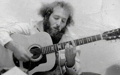Lenny Mandel, in this photo, both youngish and younger, always has been a musician.