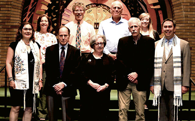 Pictured, back row, from left, are Jill Kantor, financial secretary; Marc Chelemer, treasurer; Greg Janoff, assistant financial officer; and Amanda Eastman, assistant secretary. Cantor Dubinsky, Alan Winters, first vice president; Marsha Sobel, president; Steve Clark, third vice president; and Rabbi Sirbu, are pictured in the front. Stacey Butler, second vice president, and Hildy Dillon, secretary, are not pictured.