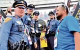 These are the police officers at the temporarily renamed New York/New Jersey Stadium who helped Rabbi Boteach.