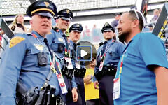 These are the police officers at the temporarily renamed New York/New Jersey Stadium who helped Rabbi Boteach.