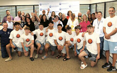 The players from Nahariya with staffers at the Jewish Federation of Northern New Jersey. (All photos courtesy JFNNJ)