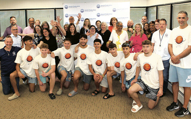 The players from Nahariya with staffers at the Jewish Federation of Northern New Jersey. (All photos courtesy JFNNJ)