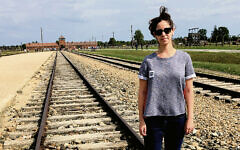 Logan Brenner stands on the tracks in Auschwitz. (Photos courtesy Logan Brenner)