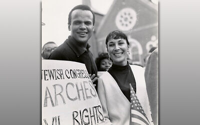 Harry Belafonte at the 1963 March on Washington. Black celebrities worked with Jewish organizations to advance civil rights. Harry Belafonte, of partial Sephardic Jewish descent, and his wife, activist Julie Robinson, attended voting rights events sponsored by the American Jewish Congress. Belafonte was inspired in part by Black performer and activist Paul Robeson, a vocal ally of Jewish Americans. (Image courtesy of the American Jewish Historical Society, New York. From the Records of the American Jewish Congress (I-77))