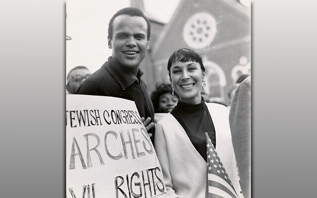 Harry Belafonte at the 1963 March on Washington. Black celebrities worked with Jewish organizations to advance civil rights. Harry Belafonte, of partial Sephardic Jewish descent, and his wife, activist Julie Robinson, attended voting rights events sponsored by the American Jewish Congress. Belafonte was inspired in part by Black performer and activist Paul Robeson, a vocal ally of Jewish Americans. (Image courtesy of the American Jewish Historical Society, New York. From the Records of the American Jewish Congress (I-77))