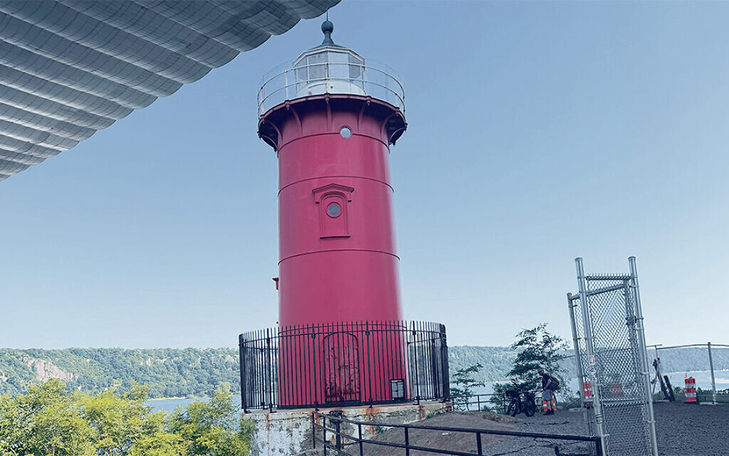 The little red lighthouse and the great gray bridge. The little red lighthouse and the great gray bridge.