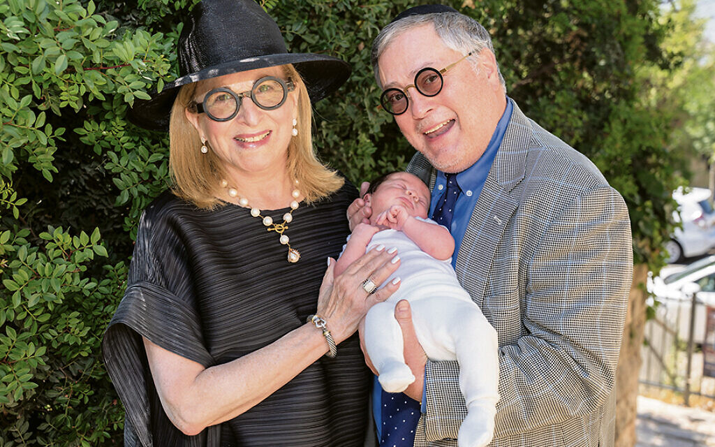 Gail and Jeremy Fingerman hold their newest grandchild, Avraham Chaim. Gail and Jeremy Fingerman hold their newest grandchild, Avraham Chaim.