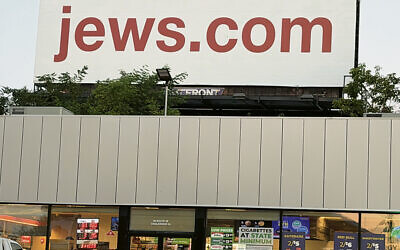 The sign looms over a gas station convenience store on Route 4. (Andy Sherman)