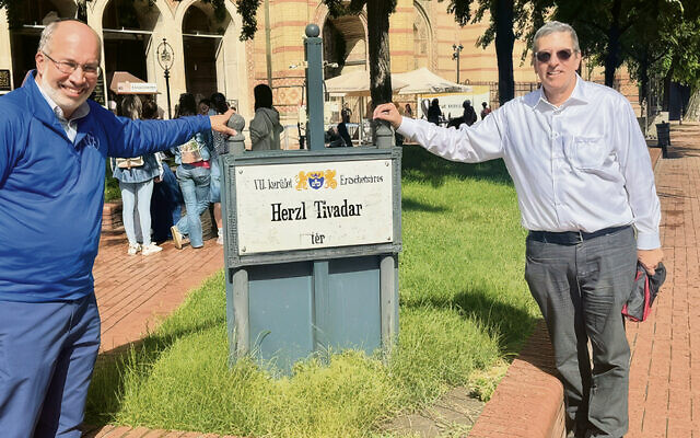Mark Levenson, right, and the AZM’s executive director, Herbert Block, in Budapest, point to a sign marking Theodor Herzl’s birthplace; they were in Hungary for an AZM conference. (All photos courtesy Mark Levenson)