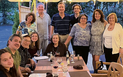 The family gathered in 2022; they include Leonard Cole, third from left; Ruth Cole, at the head of the table; and Naomi Eichen, at the right; Leonard and Ruth’s children, Wendy, Philip, and Bill, are there too, along with grandchildren and other relatives.