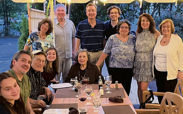 The family gathered in 2022; they include Leonard Cole, third from left; Ruth Cole, at the head of the table; and Naomi Eichen, at the right; Leonard and Ruth’s children, Wendy, Philip, and Bill, are there too, along with grandchildren and other relatives.